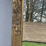 vintage beveled mirror in rectangular shape stucco and gilded wood in Louis XV baroque style