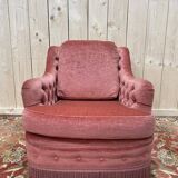 Fauteuil style crapaud en velours rose capitonné