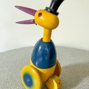 Ancien jouet à pousser, cigogne en bois