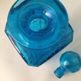 Blue glass bottle with glass cap