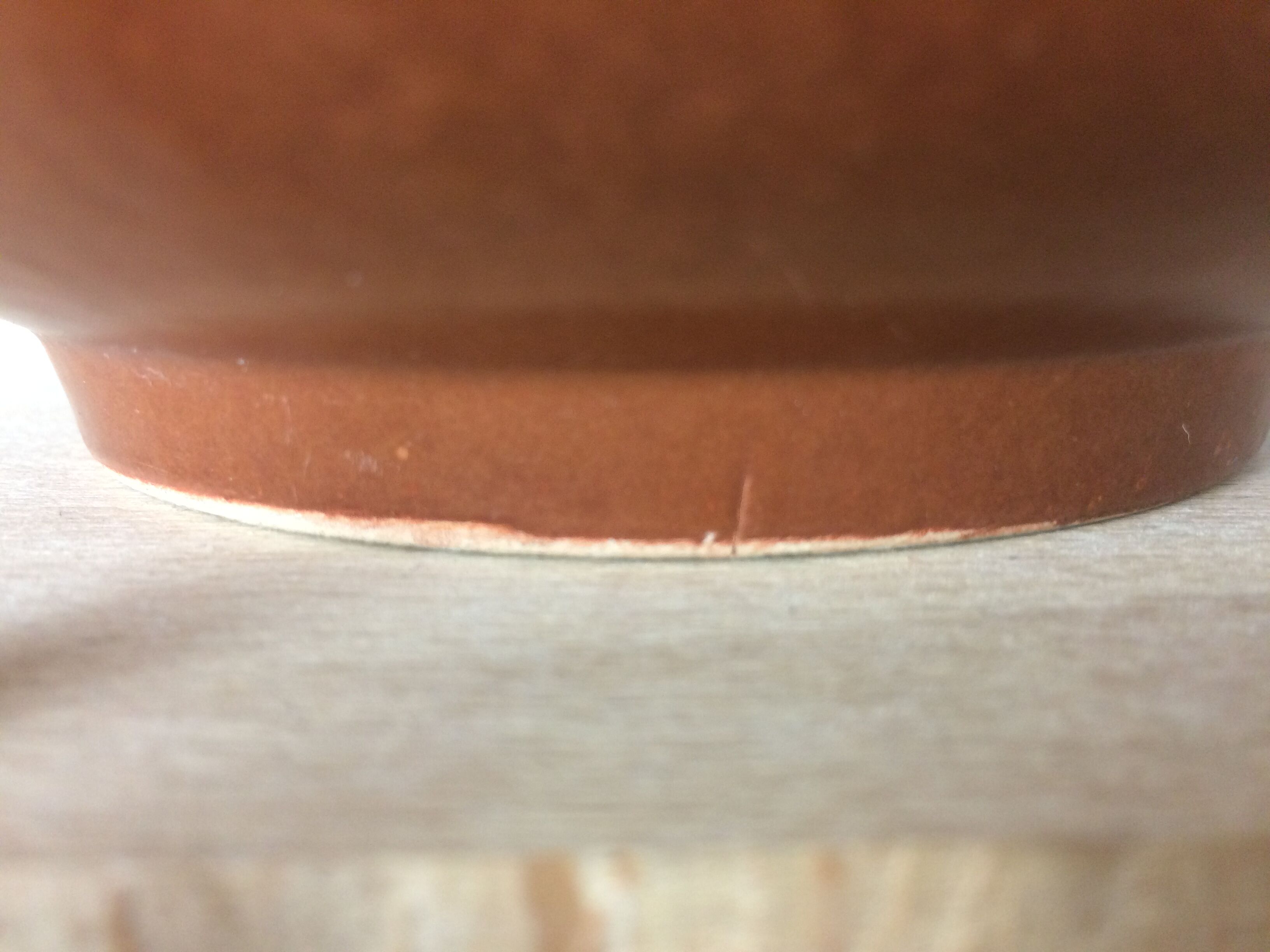 Orange and brown ceramic salad