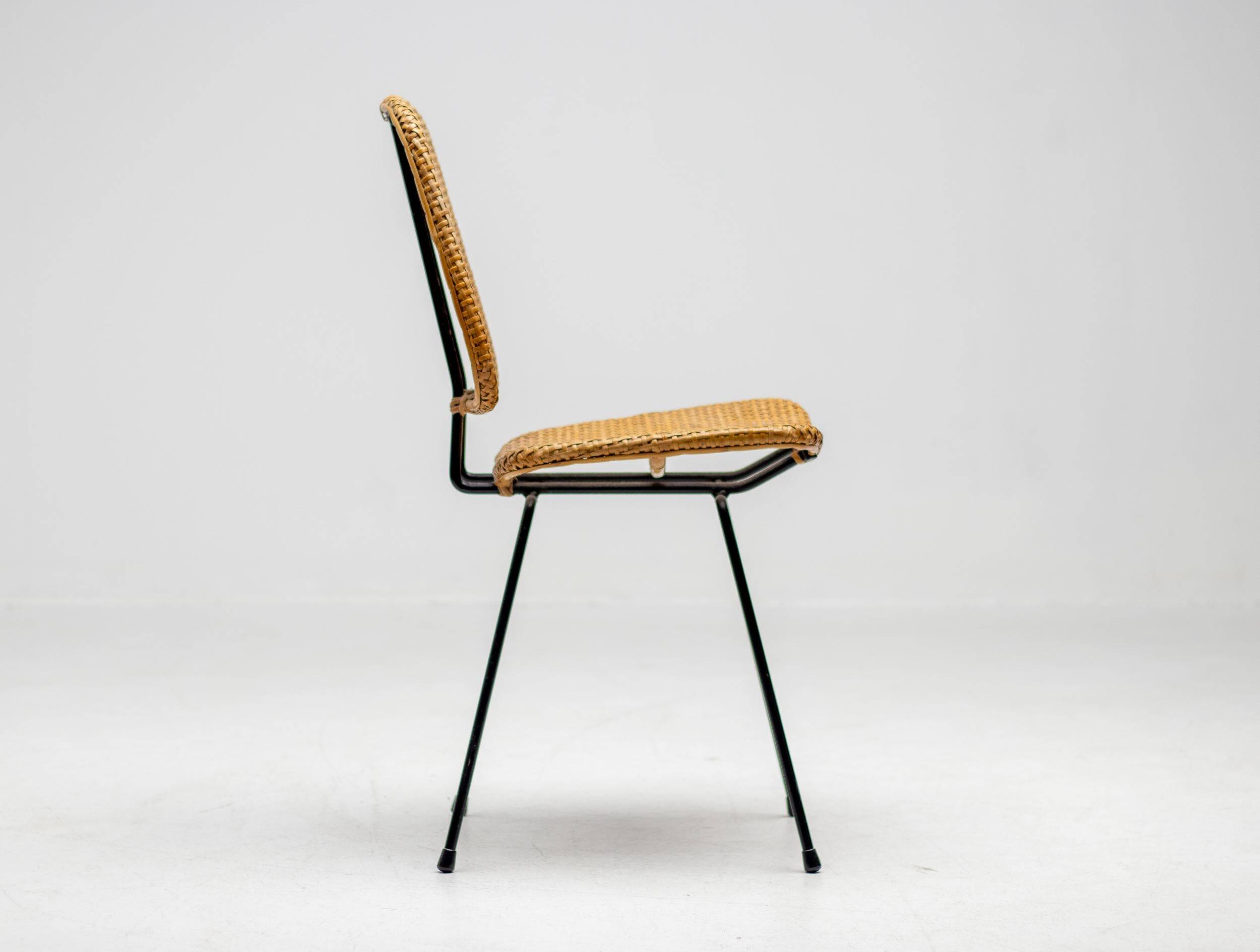 Elegant Italian black accent chair with a stem and cane, 1950.