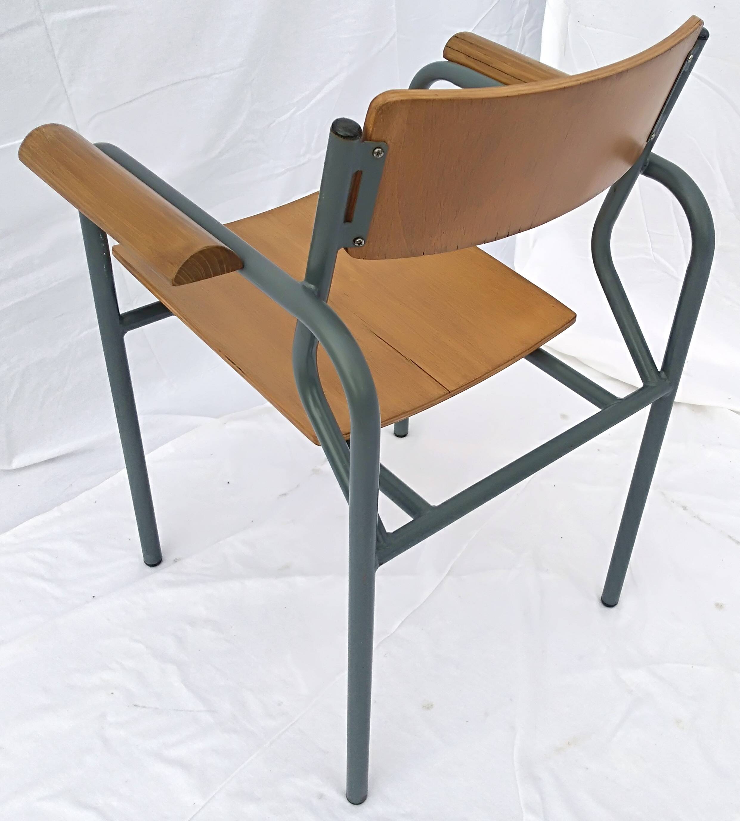 armchair tubular structure wooden seat and armrests