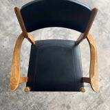 Set of 2 vintage beech wood armchairs with black skai upholstery — mid-century modern