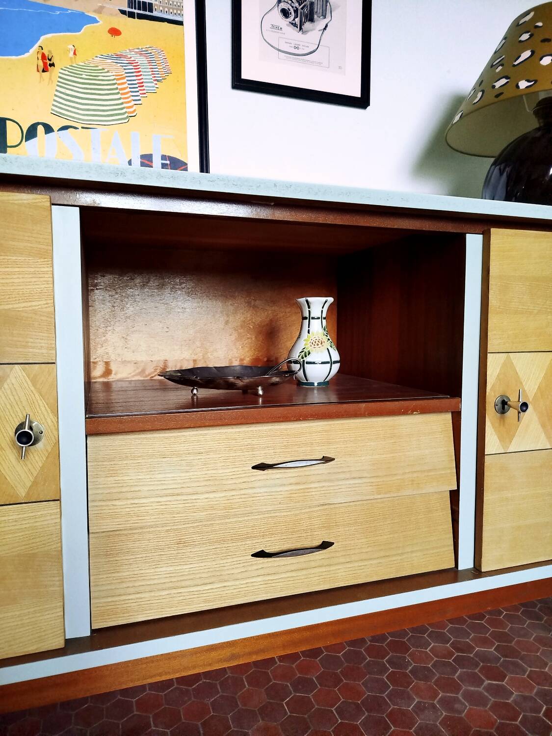 Wooden sideboard in soft green