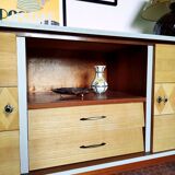 Wooden sideboard in soft green