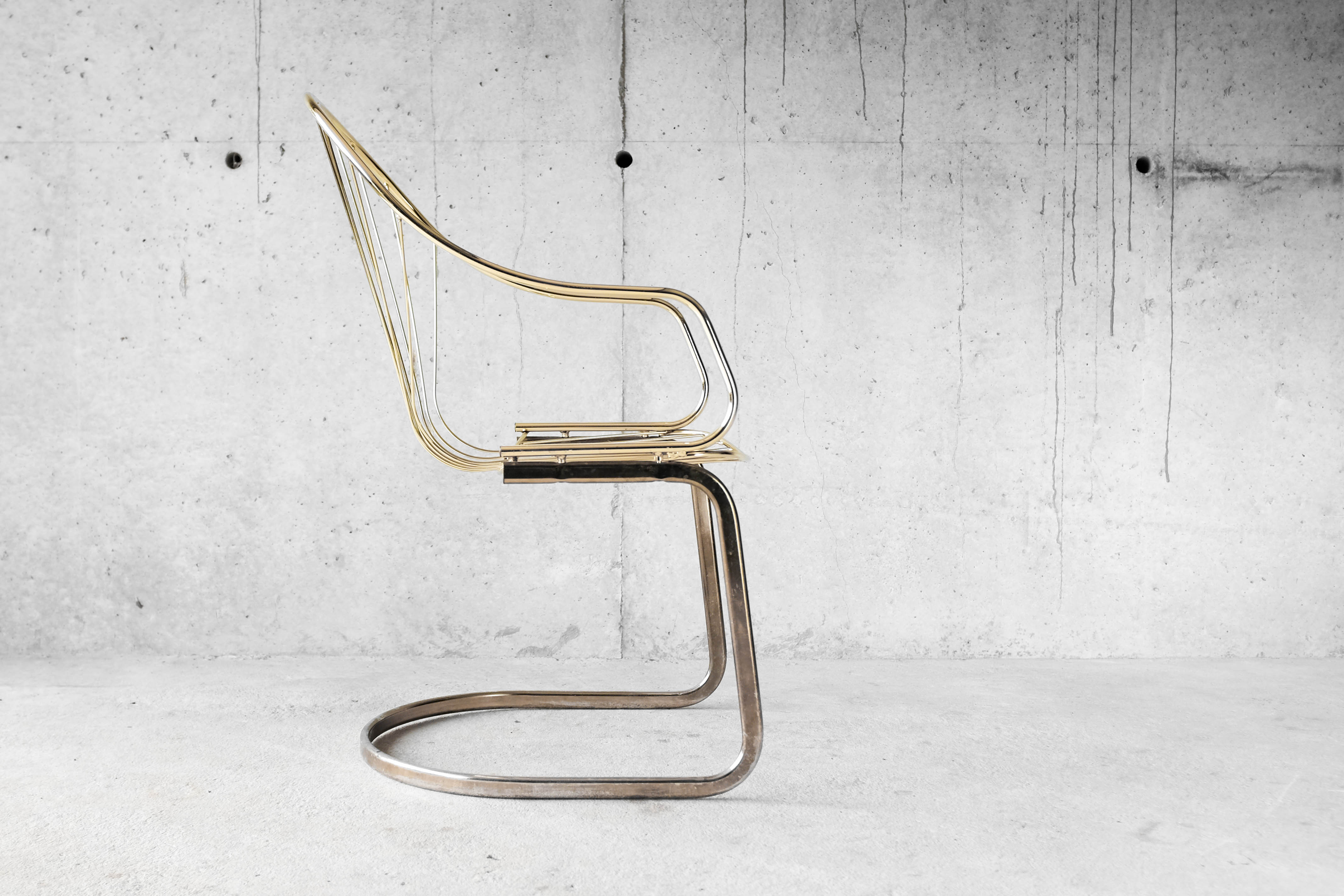 Golden metal armchair 70s