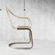 Fauteuil métallique doré années 70