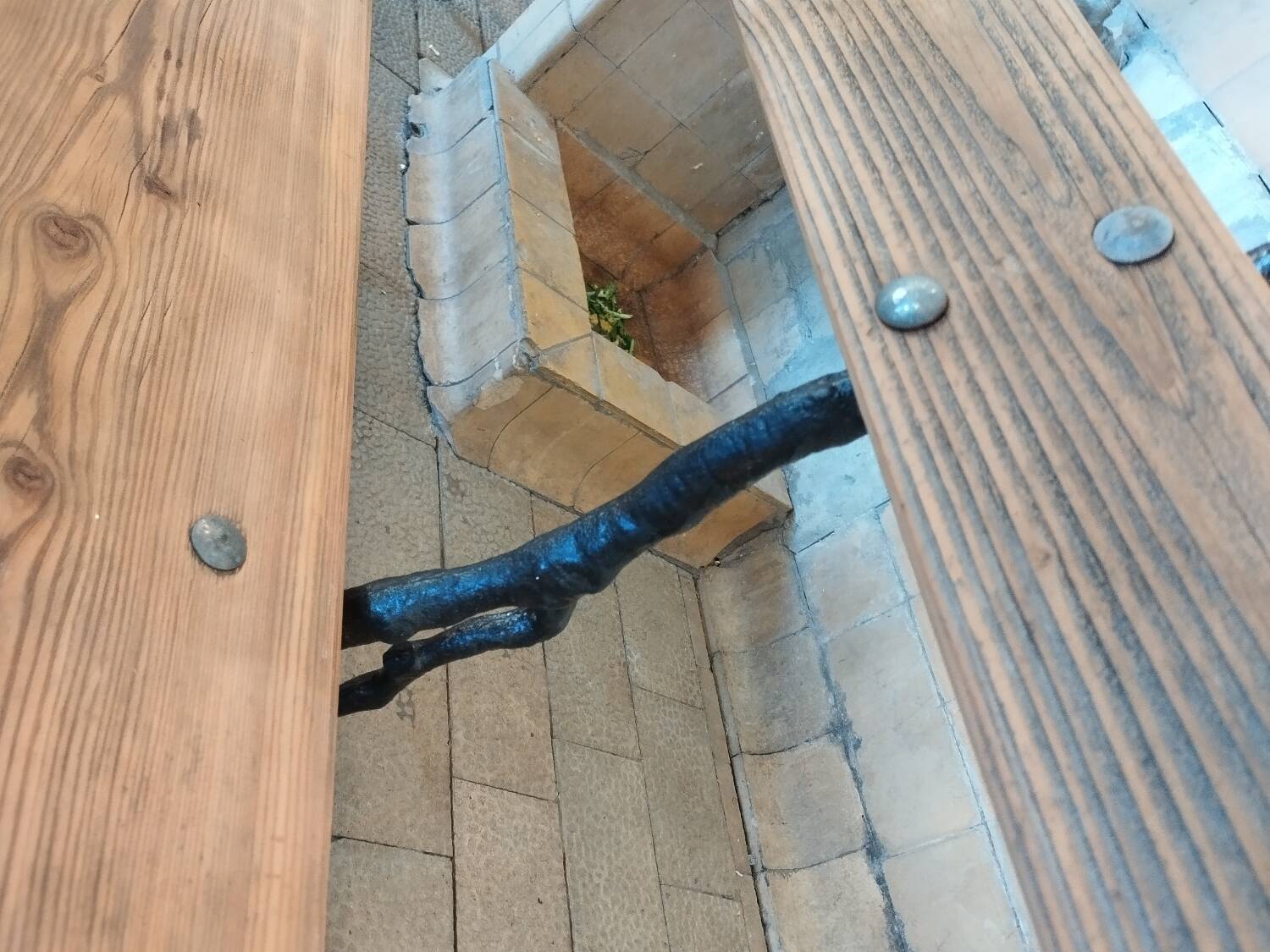 Antique garden bench with cast iron legs