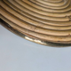 Rattan trivets attributed to Gabriella Crespi.