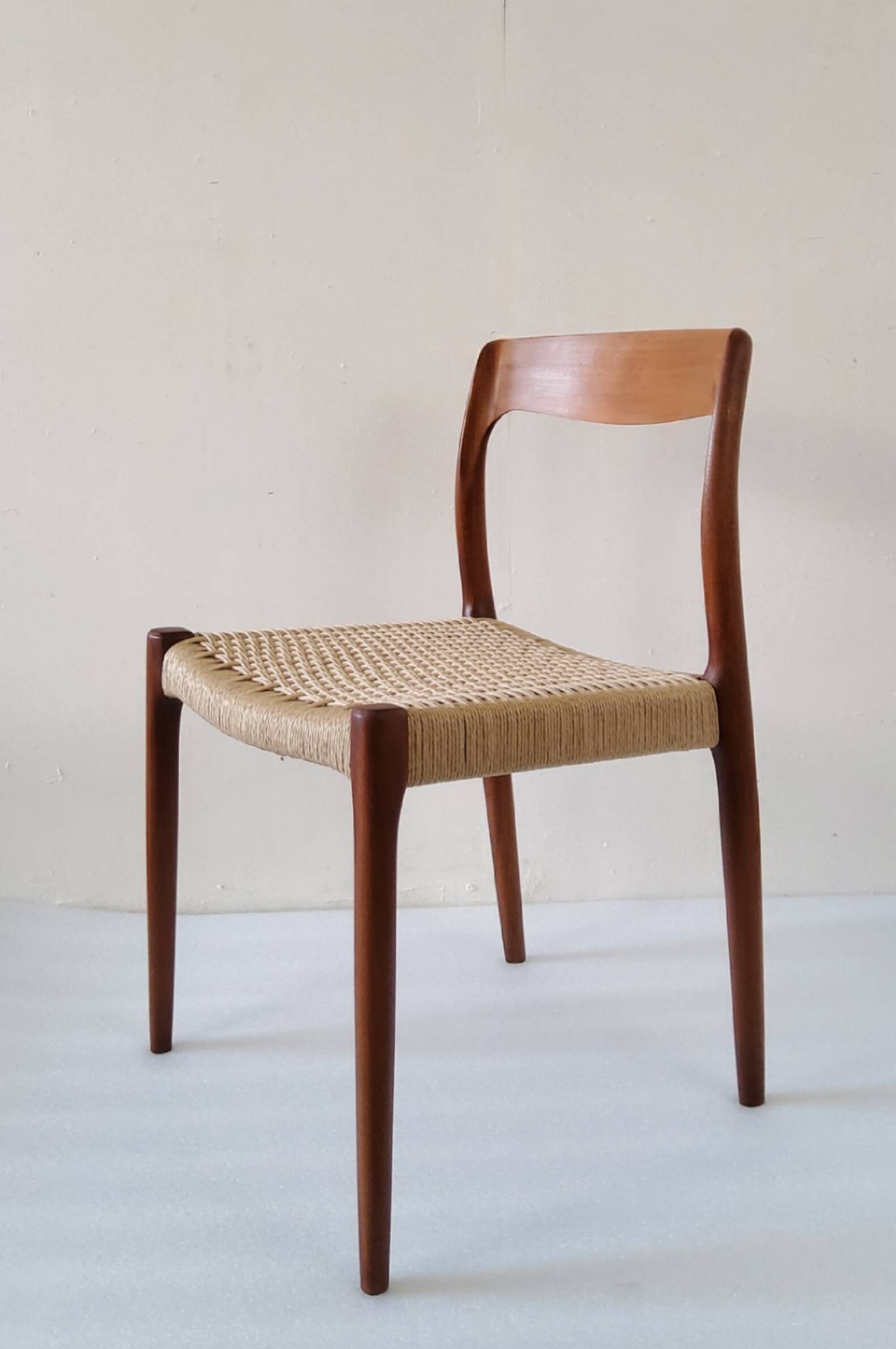 Danish dining chairs in wood and paper cord
