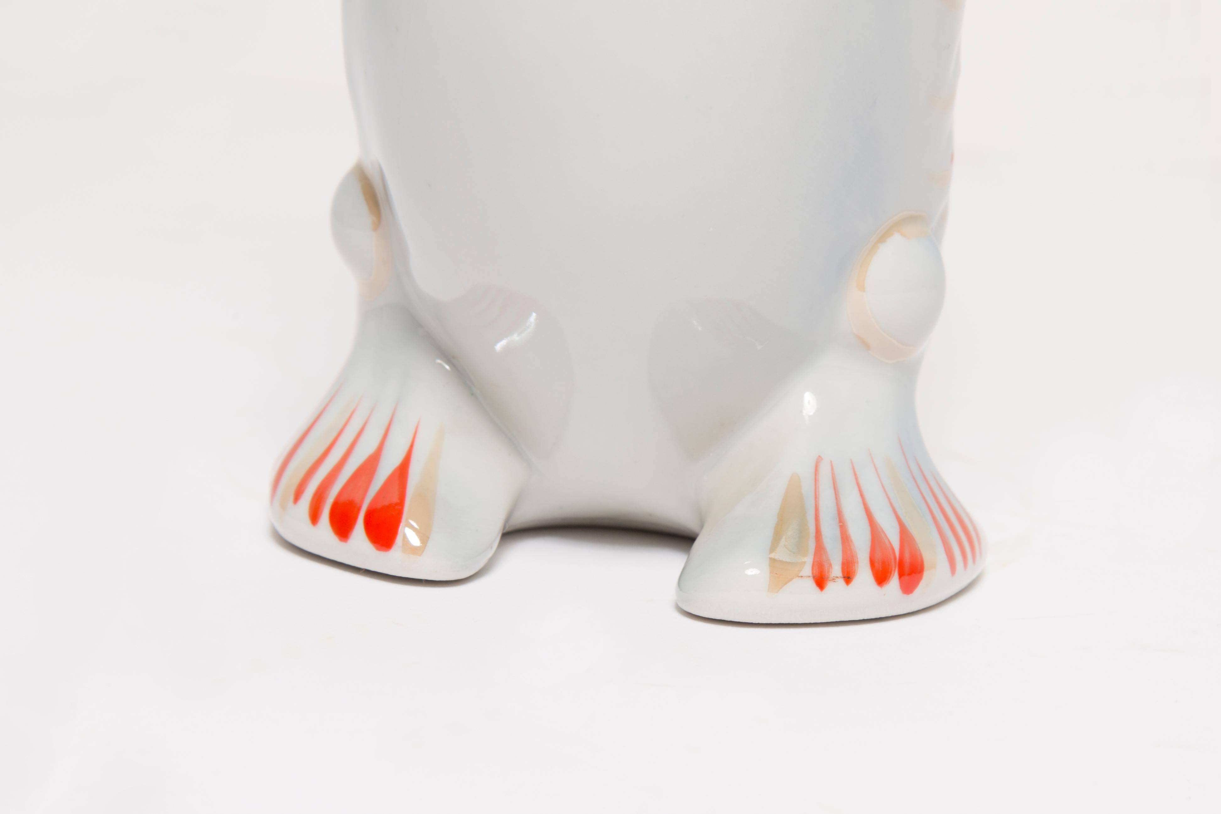 Set of 7 blue glass fish, mid-20th century.