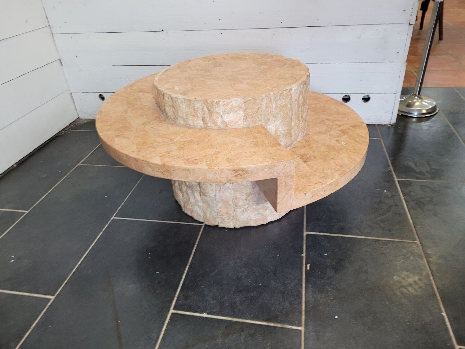 Round stone coffee table by Magnussen Ponte