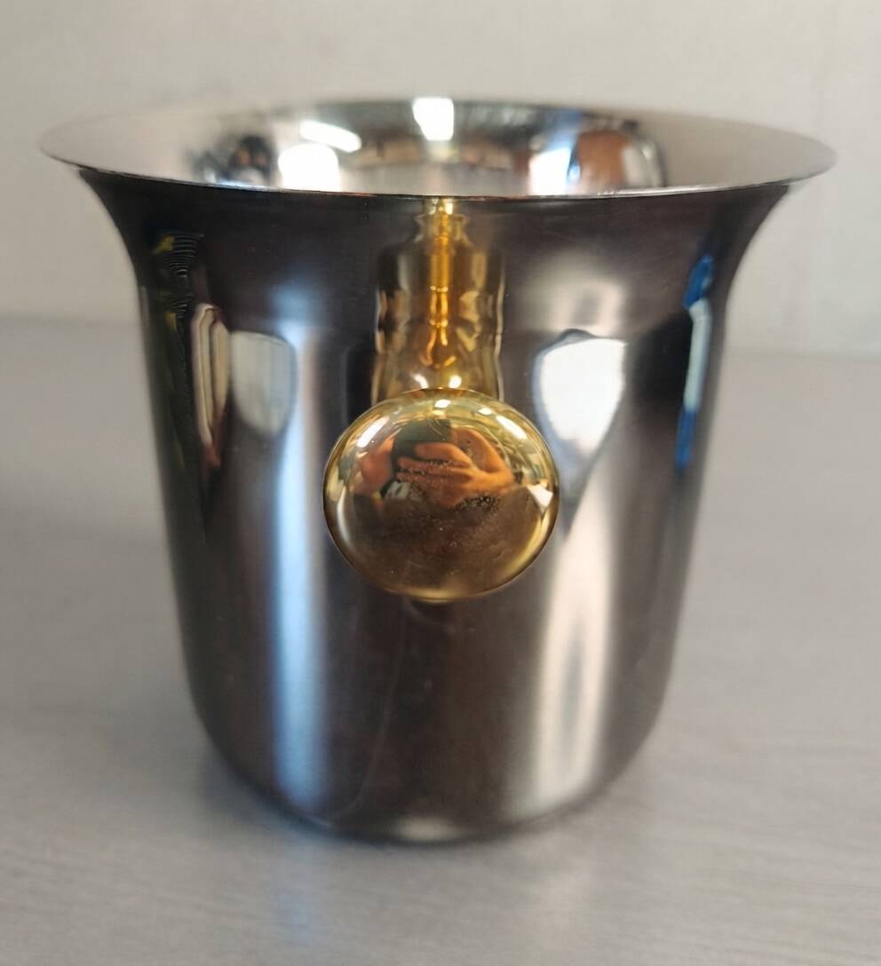 Elizabeth champagne bucket, SAF Inox, 18/10 stainless steel and Zecchino gold, 1970.