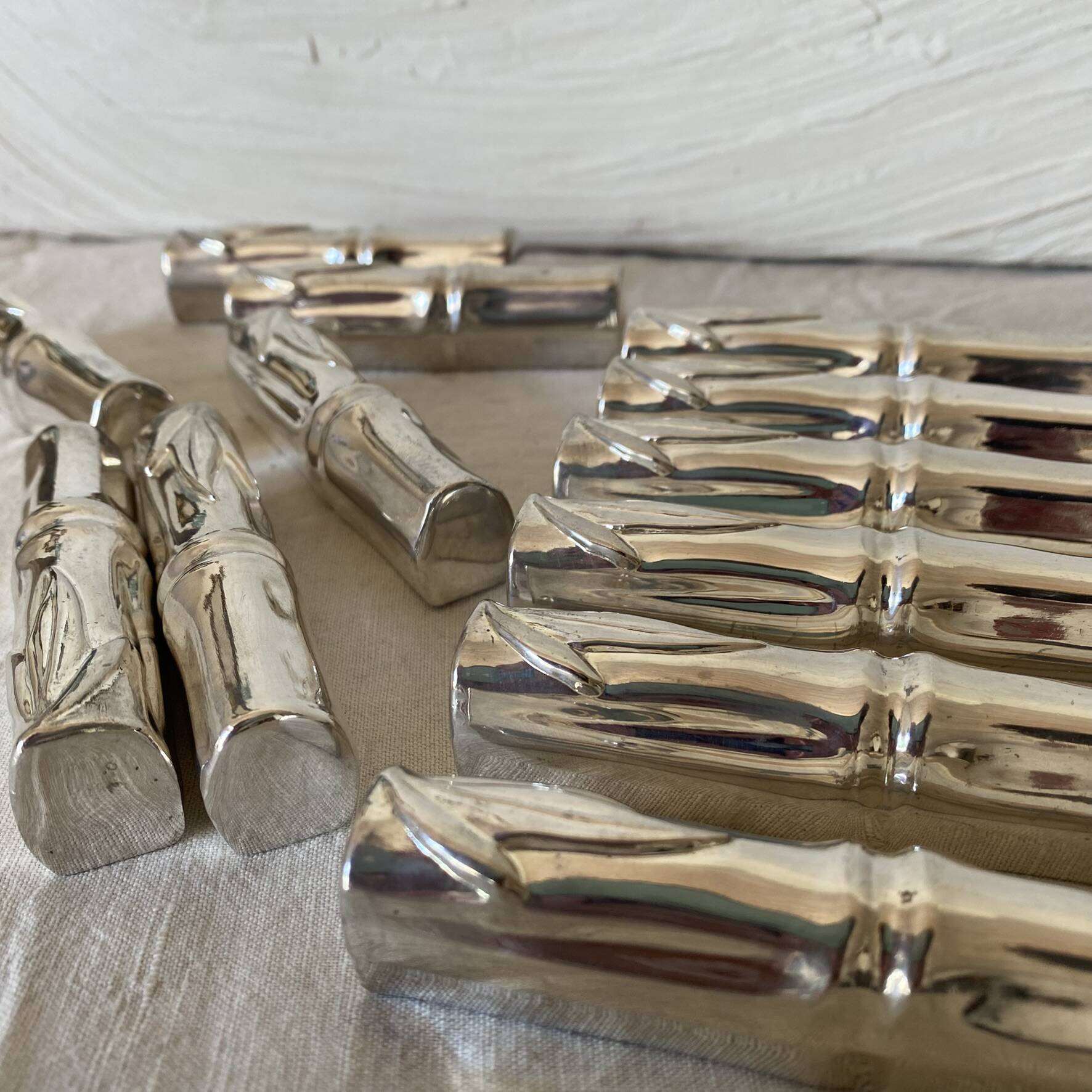Silver bamboo knife rests from the 1980s.
