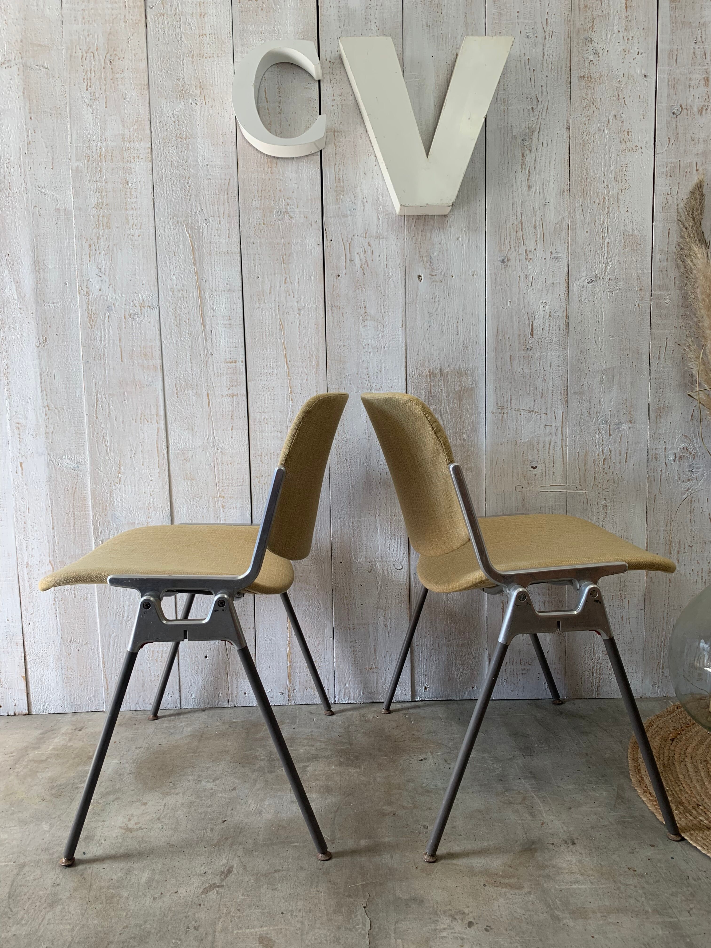 Pair of yellow Castelli chairs