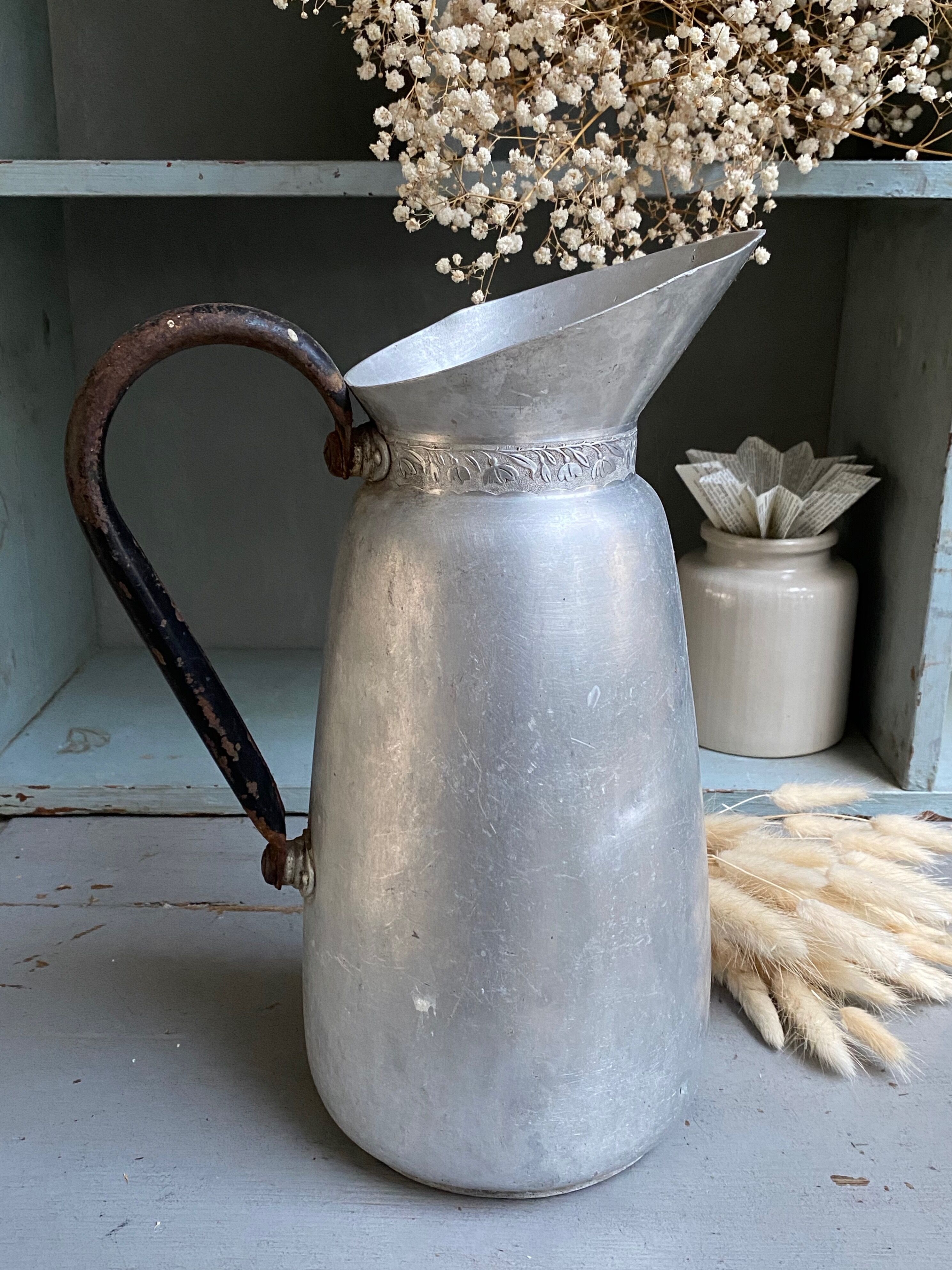 Tin pitcher