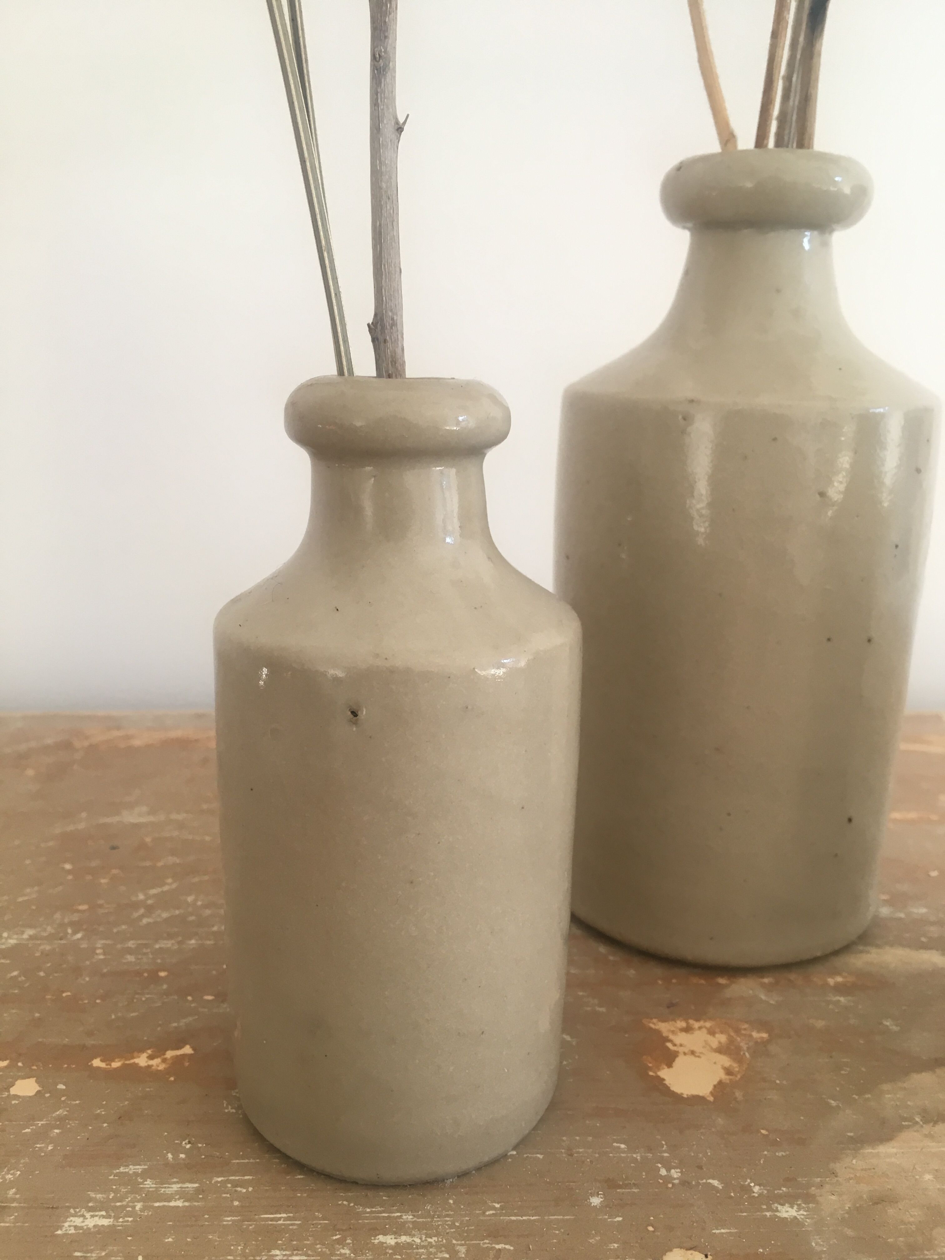 Three bottles of Mercure Bourdon Frères Paris sandstone