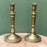 Pair of guilloché bronze candlesticks
