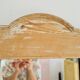 Antique mirror in raw patinated wood with pediment