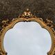 Rococo mirror in gilded wood