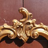Baroque frame in carved gilded wood