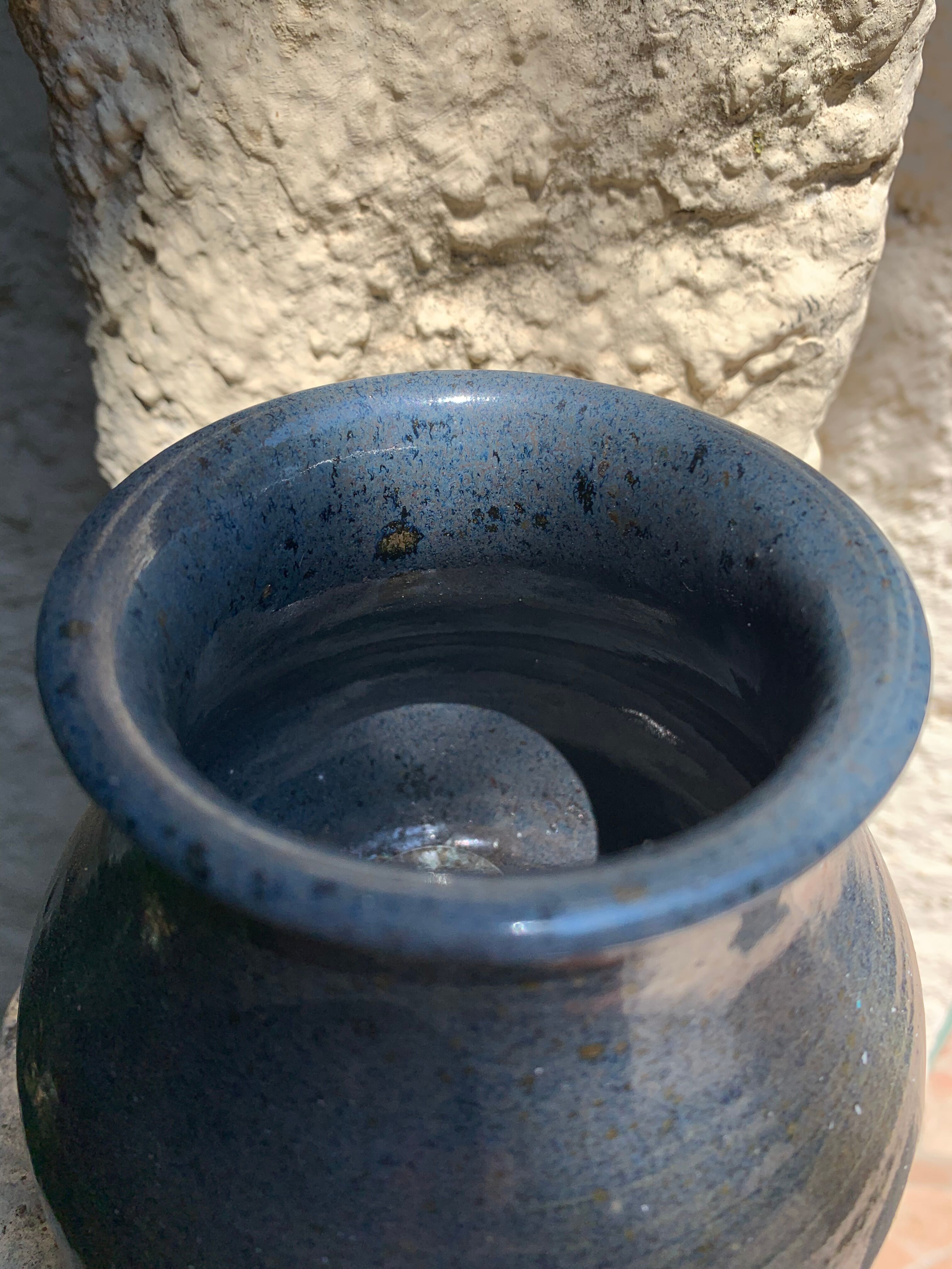 Enamelled sandstone vase