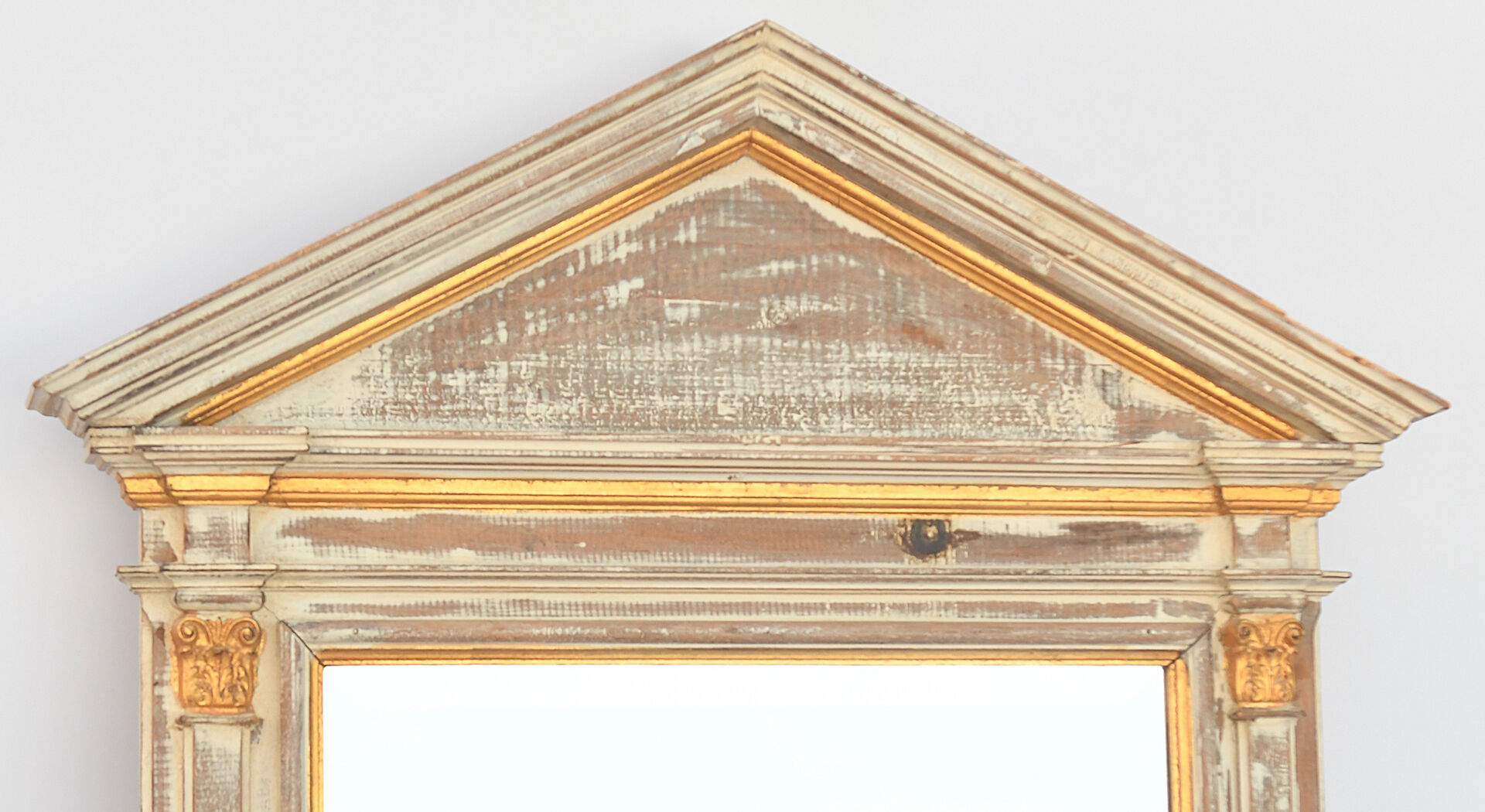 Miroir en bois cérusé et doré 105 x 71 cm