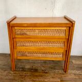 Modernist vintage chest of drawers in light chene has 3 drawers rattan top changing table