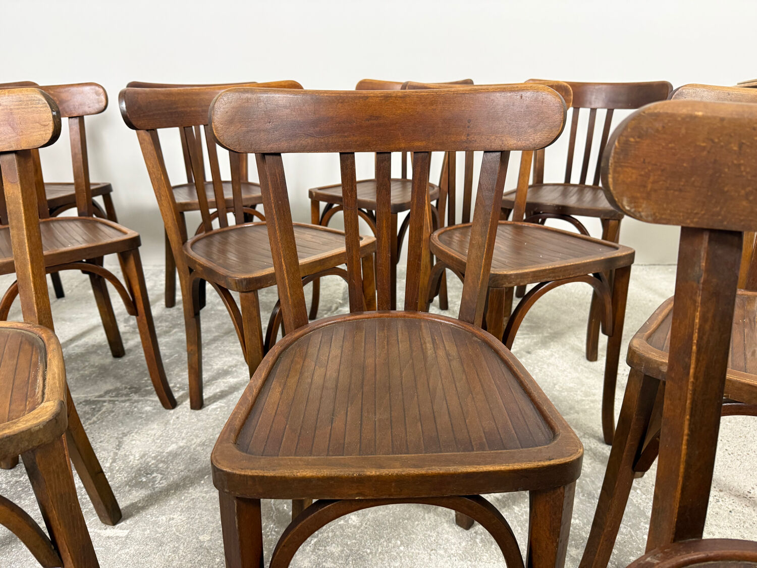 Set of 17 vintage bistro chairs in curved wood — striped seat, be