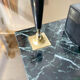 Perpetual calendar with vintage pen holder black gold marble effect