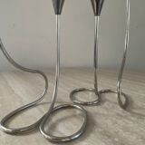 Pair of modernist silver metal candlesticks