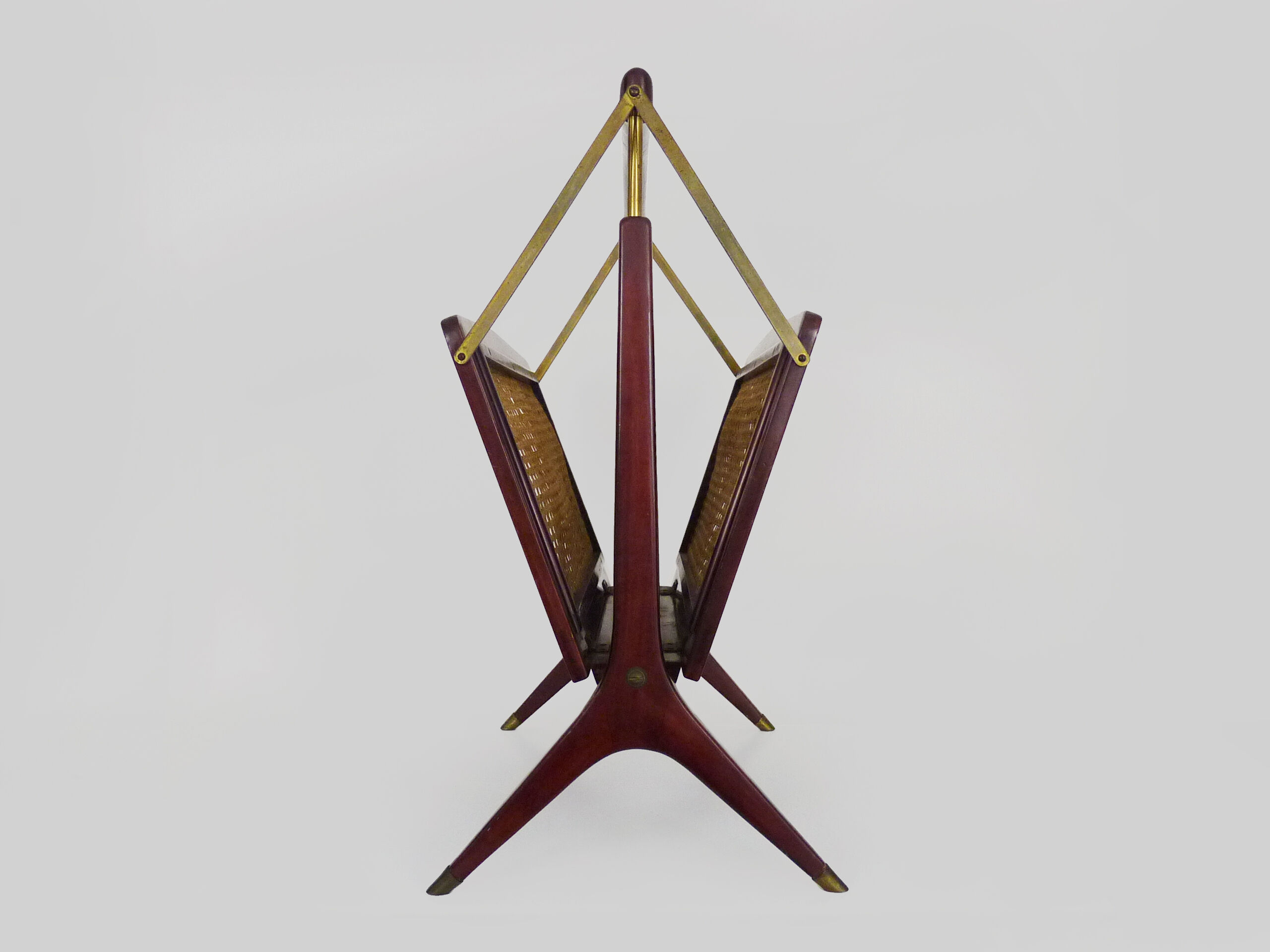 Magazine holders, italy, 1950s. walnut, canage, brass