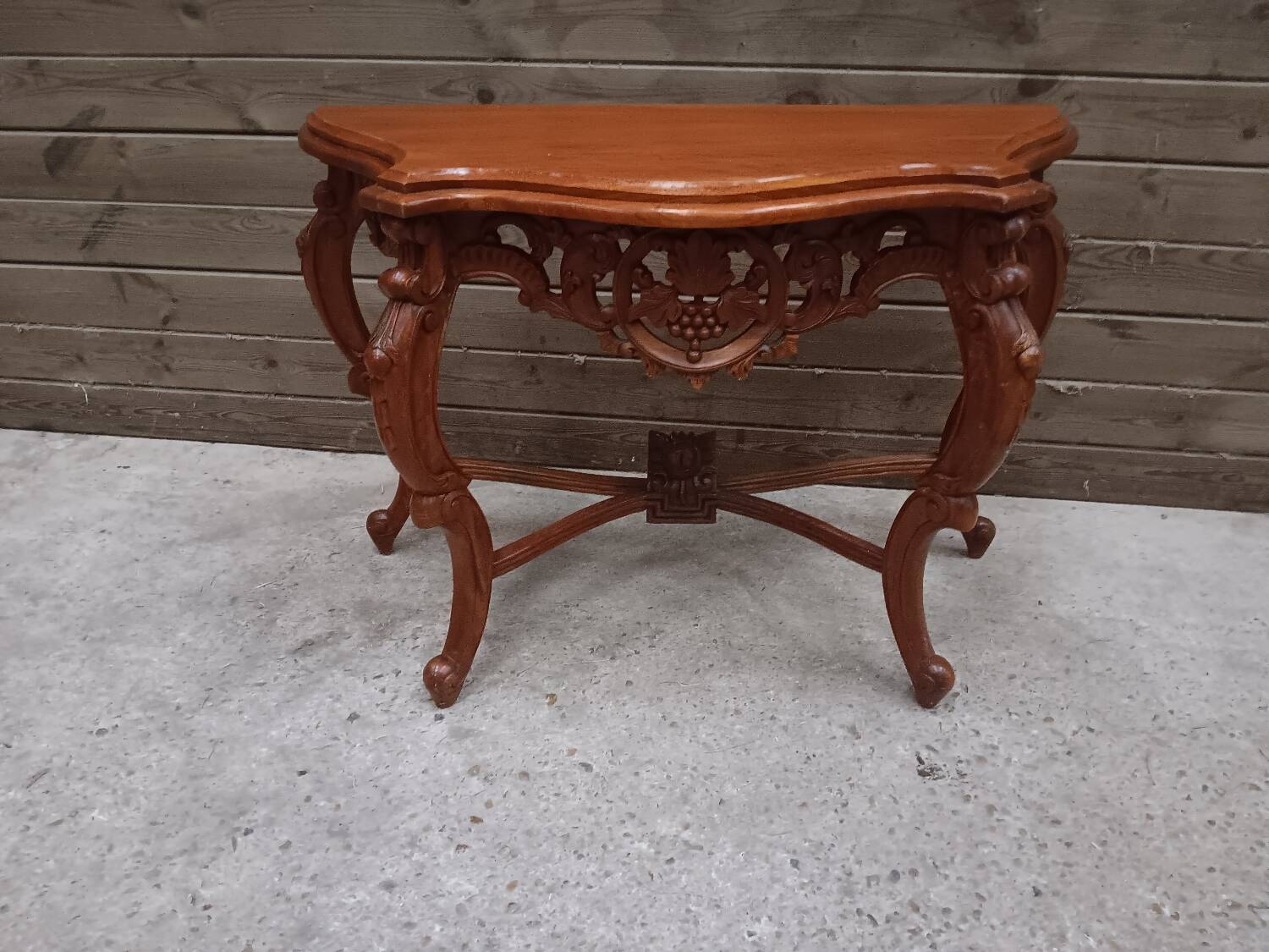 Carved wooden console