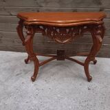 Carved wooden console