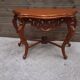 Carved wooden console
