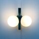 Mid-century German space age wall lamp by Kaiser Idell / Kaiser Leuchten.