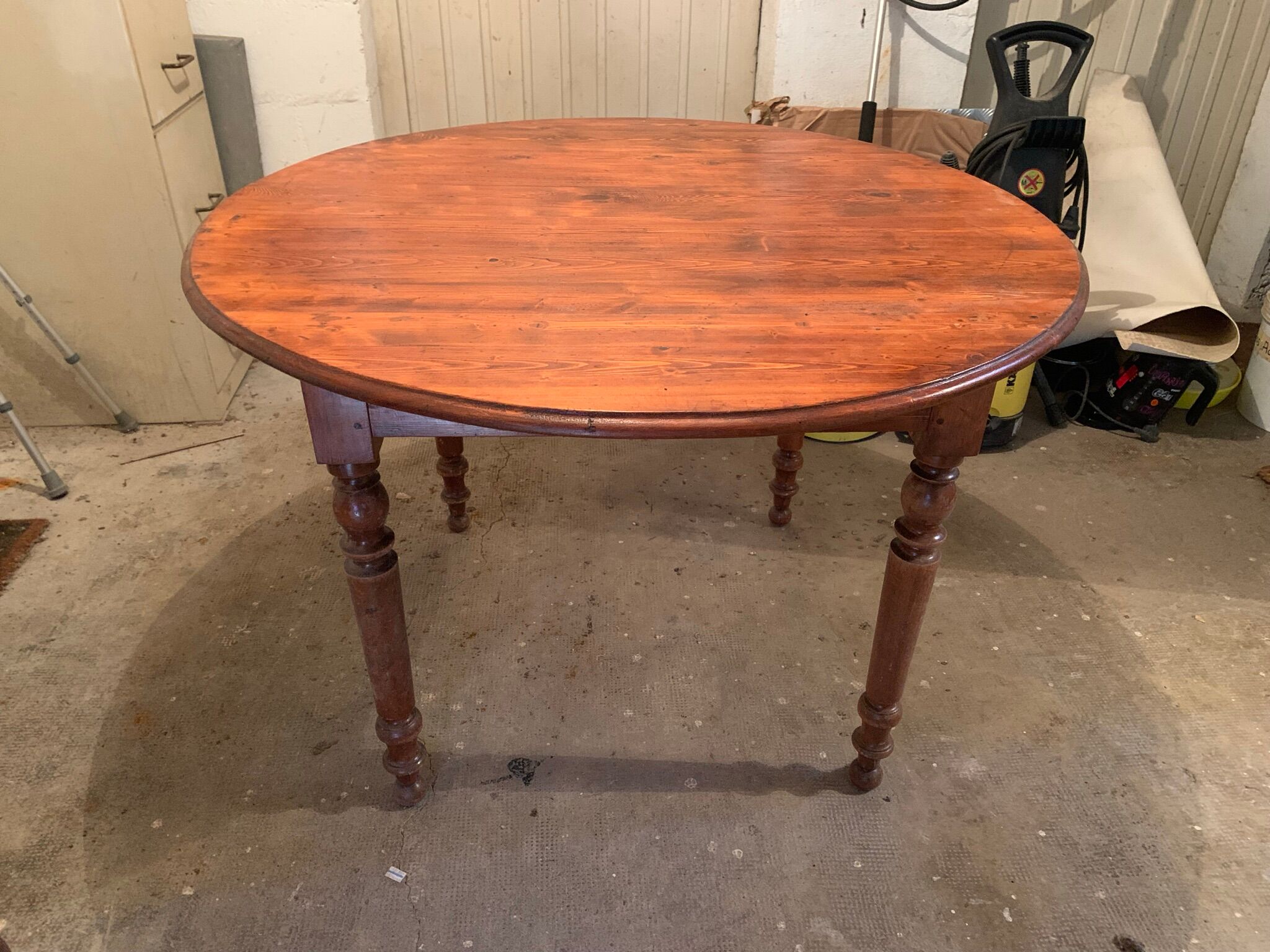 Ancient round table in pine