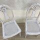 Pair of old white canne chairs