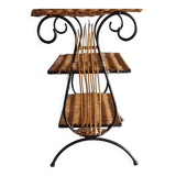 Small antique piece of furniture from the 1960s made of rattan and wrought iron in the shape of a lyre.