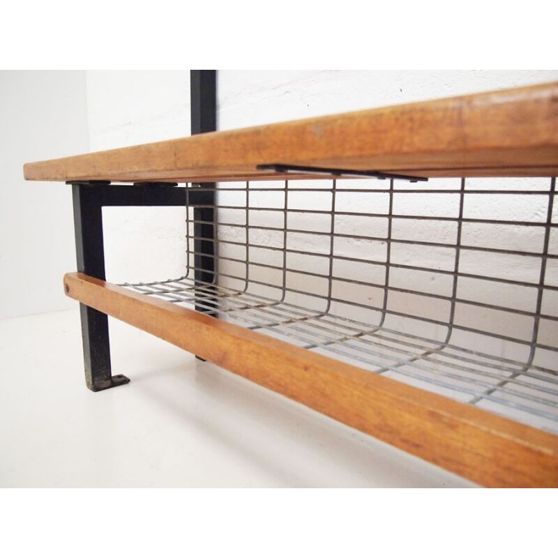 Locker room in gym with rail for coats