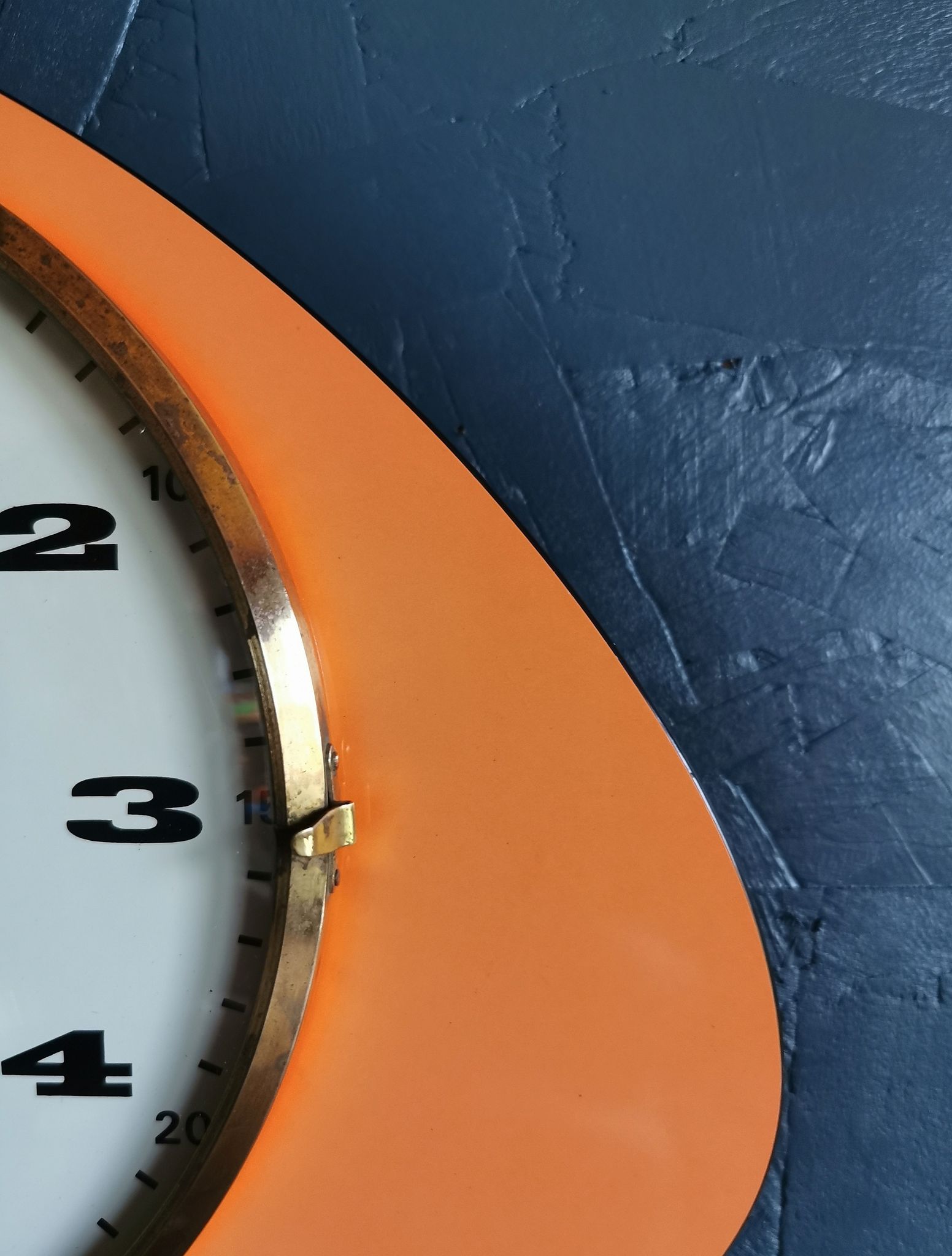 Vintage formica clock asymmetrical silent wall clock "Mervex orange"