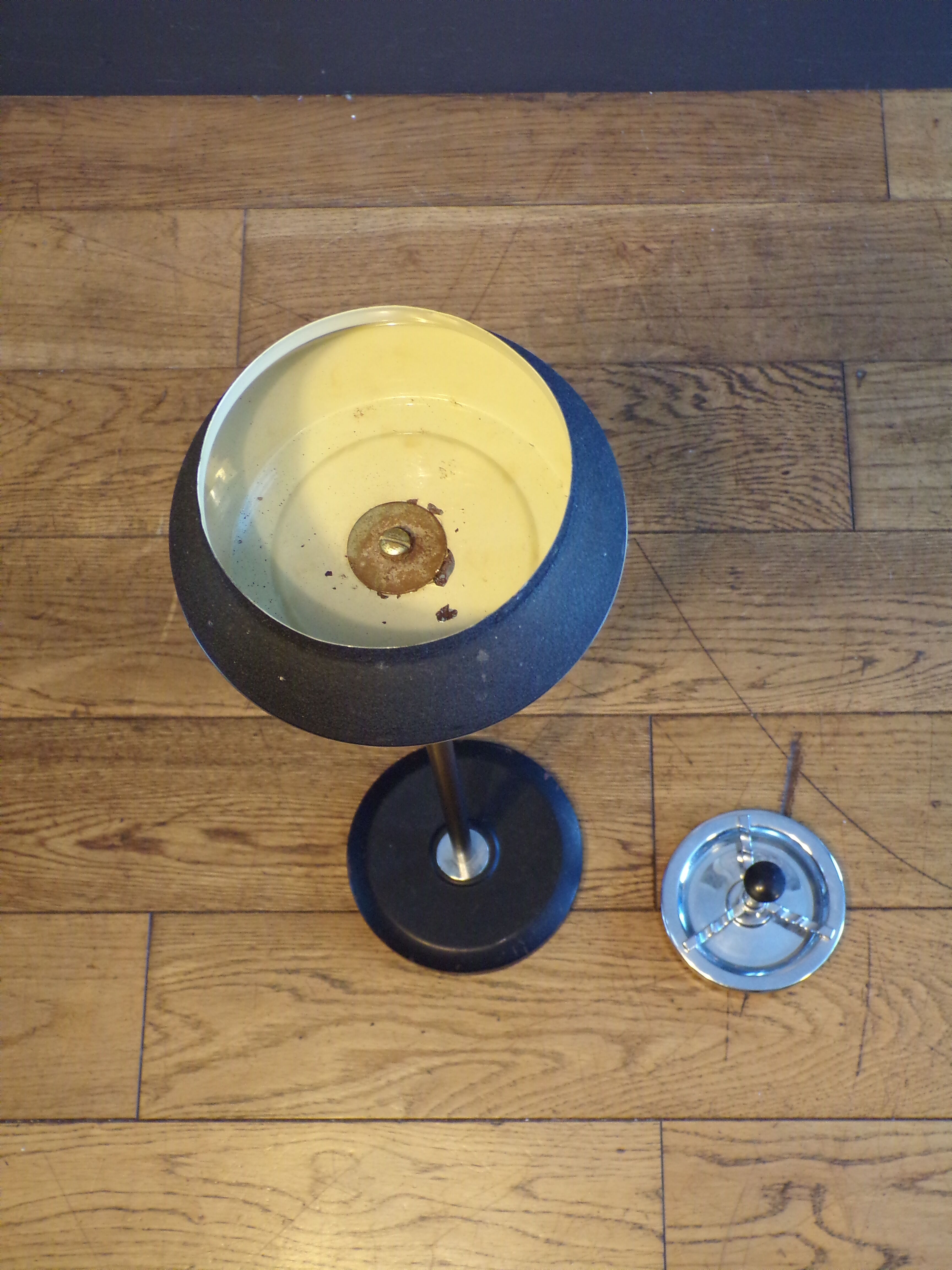 Vintage push-up ashtray on foot