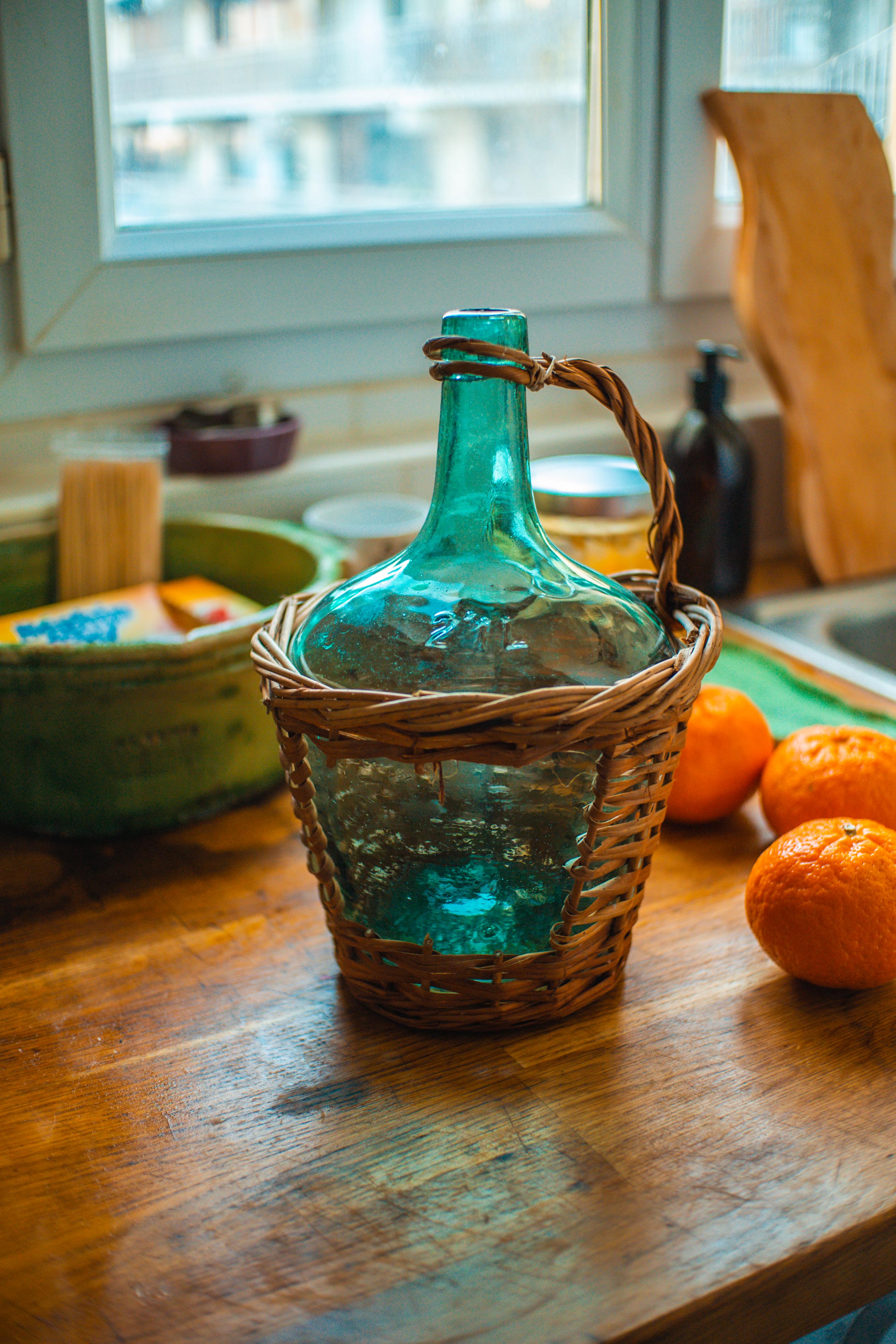 Dame Jeanne with her wicker case