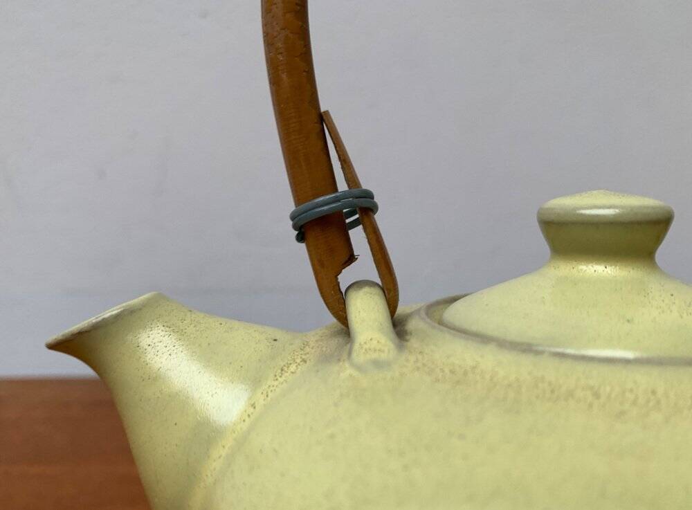Mid-century ceramic teapot with bamboo handle, 1960s.