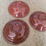 3 glazed terracotta plates