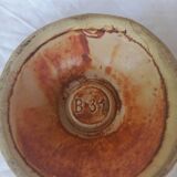 Vintage candle holder in the shape of a stylized Aladdin lamp
