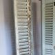 Louvered wooden shutter