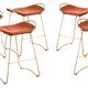 5 contemporary sculptural bar stools in metal, brass, and tobacco leather.