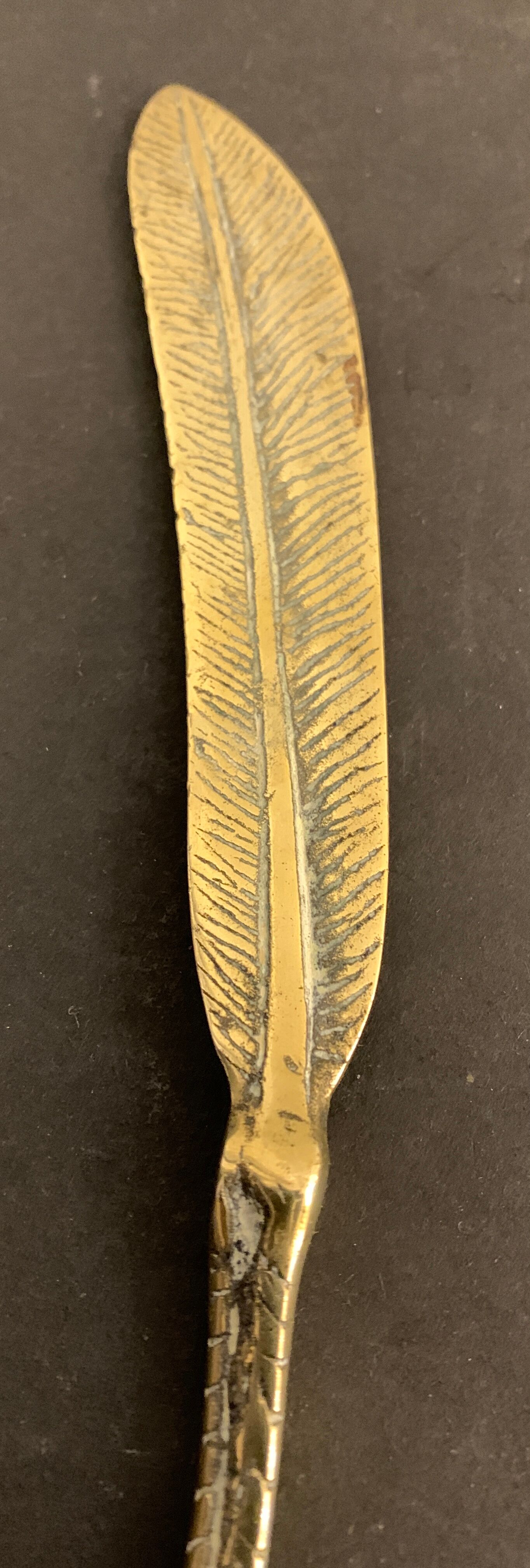 Paper cup or old bronze letter opener, eagle claw shape